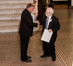 Presenting a 50 year member with his pin